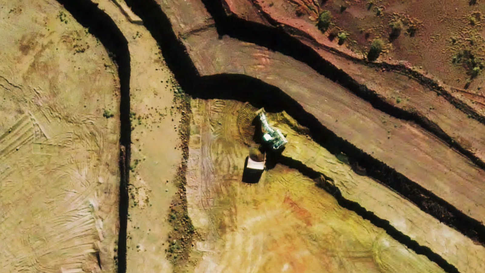 Mine site scene of Australian mine showcasing mine trucks